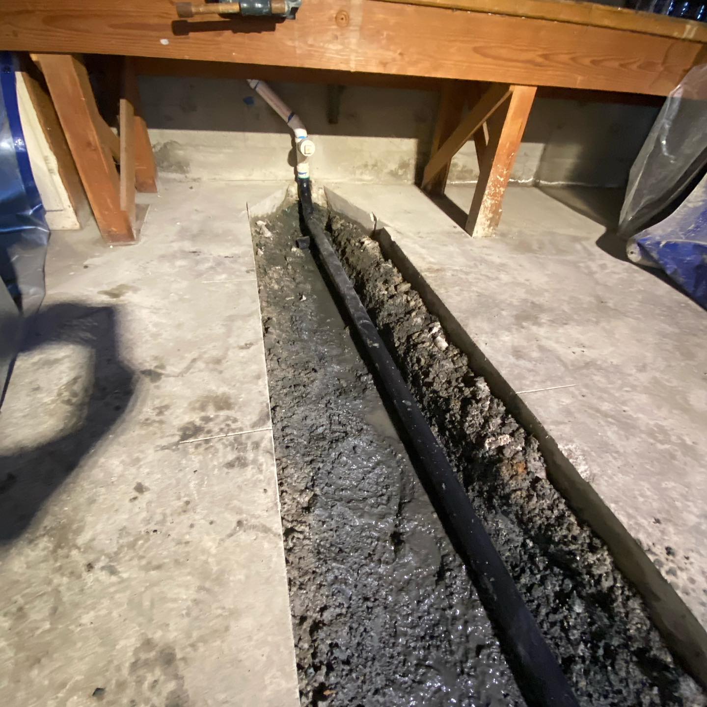 Slab plumbing trench for a new shop build